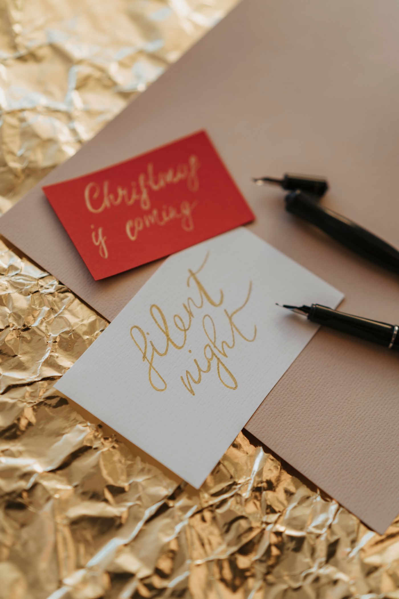 Hand-lettered greeting cards in gold ink