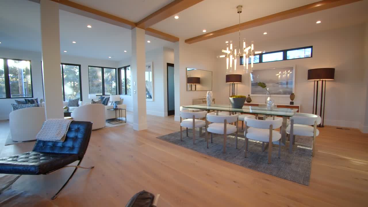 A bright, freshly finished open-plan interior with smooth walls and a flat ceiling