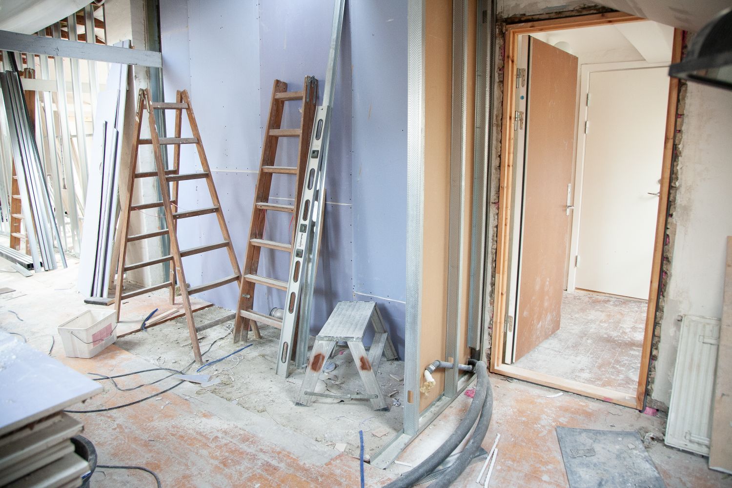 A room mid-project with a ladder set up
