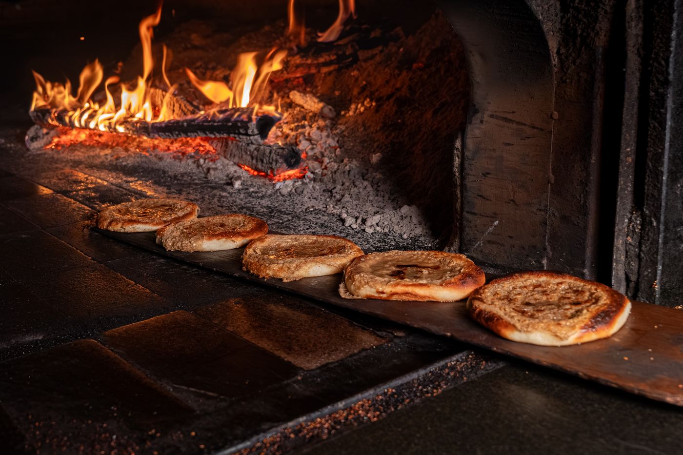 A bakery oven with bread inside