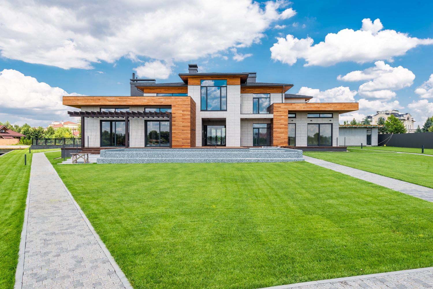 Modern home with grey architectural shingles