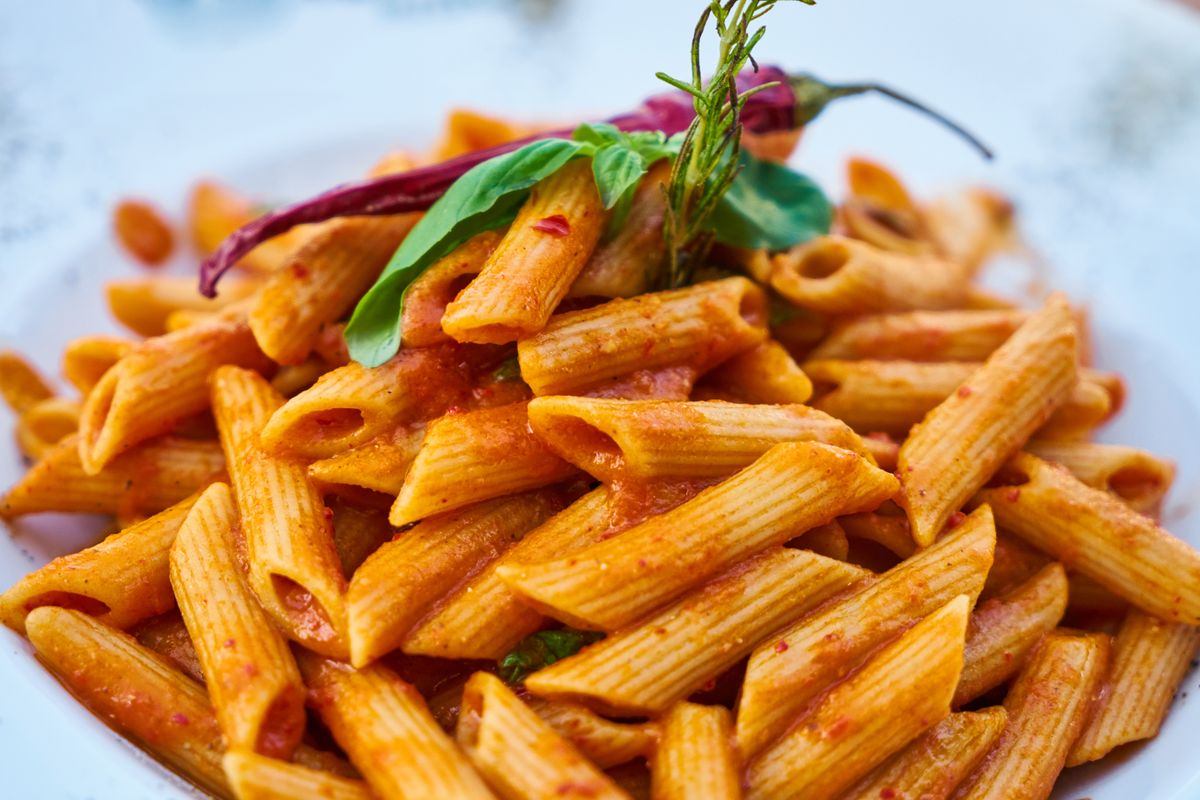 Penne in a rich tomato sauce with basil