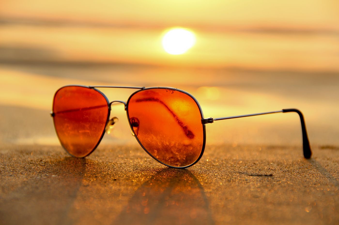 Amber-tinted aviator sunglasses