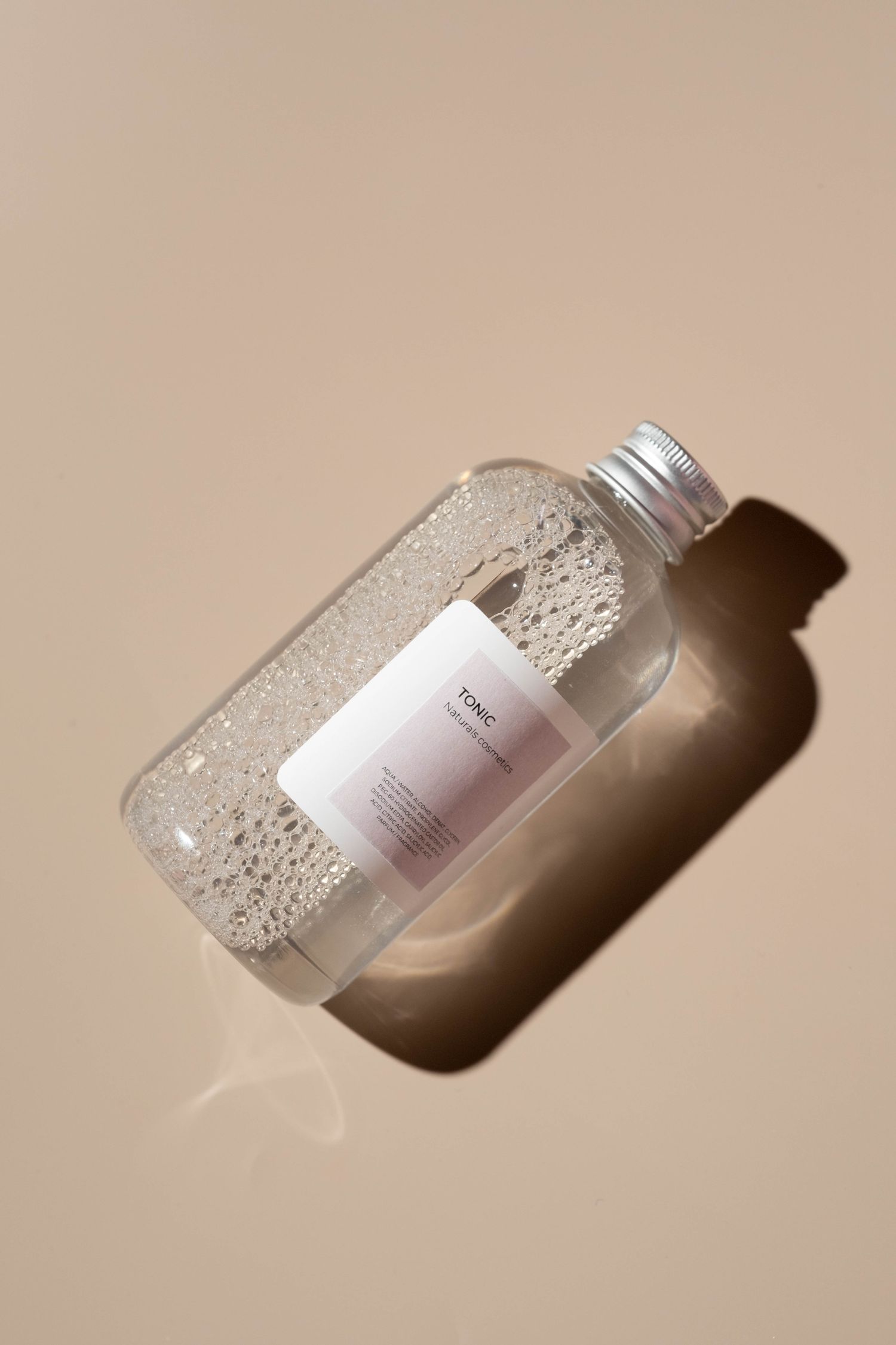 Frosted glass skincare bottle