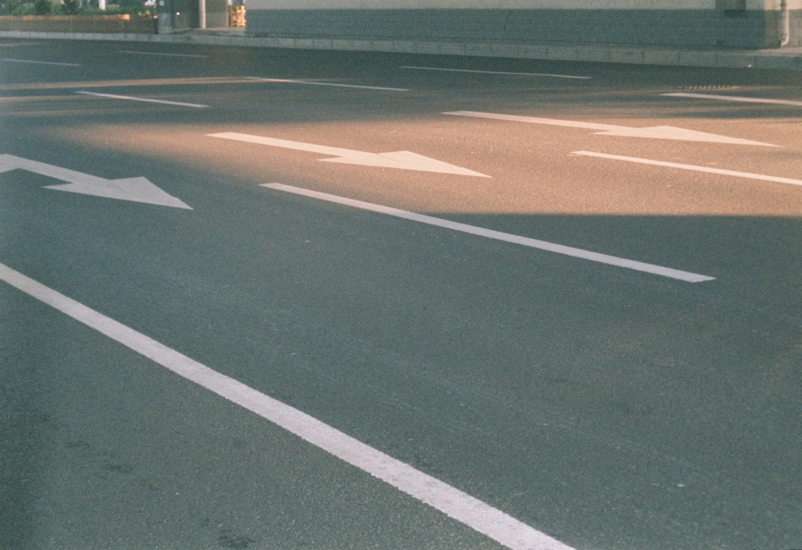 Asphalt parking surface with arrows