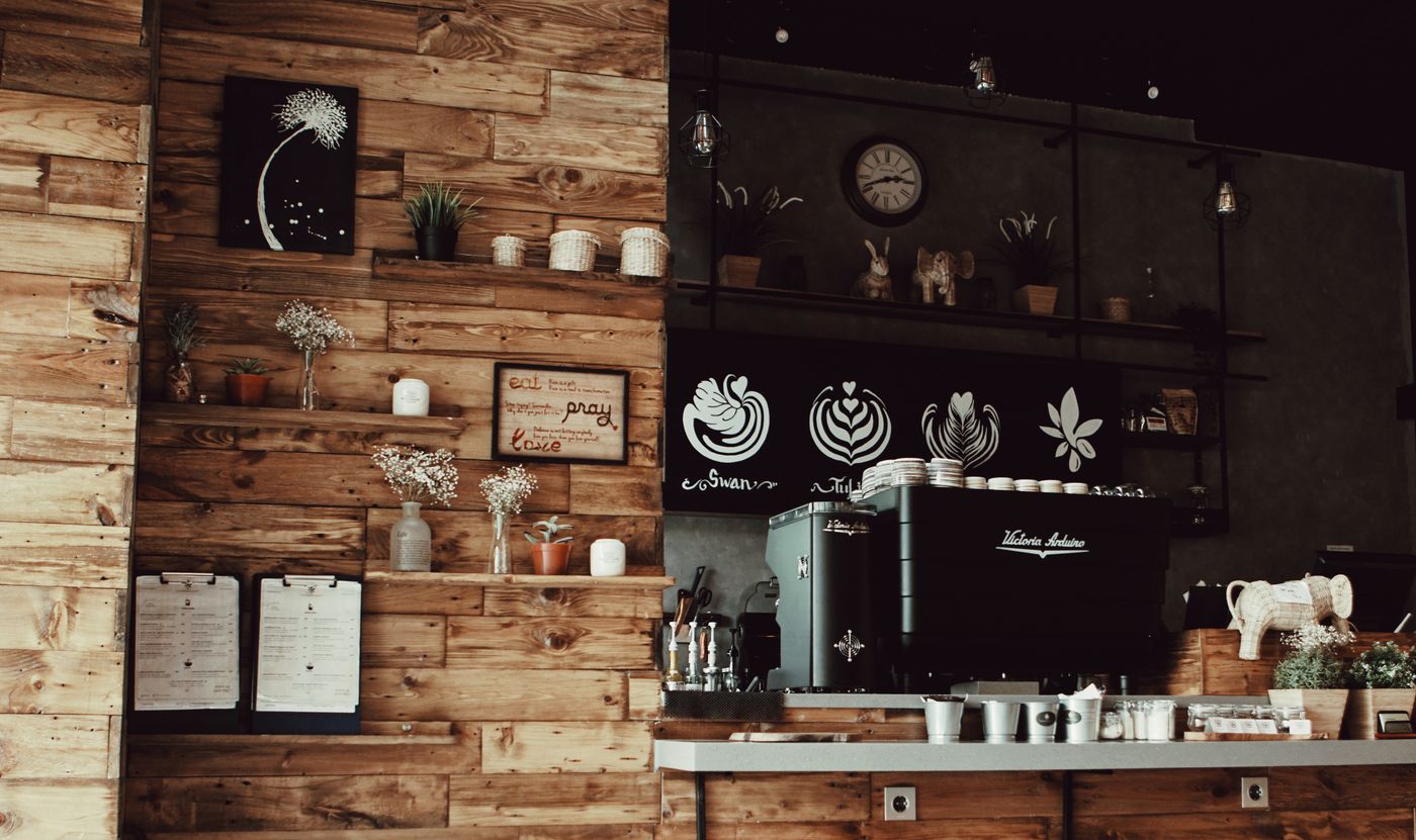 Cozy European cafe interior with espresso machine