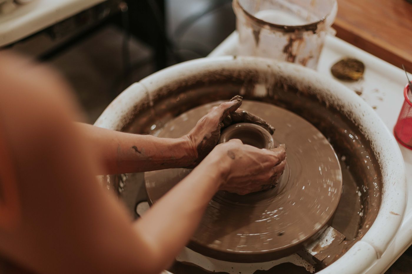 Shaping a ceramic bowl on the wheel