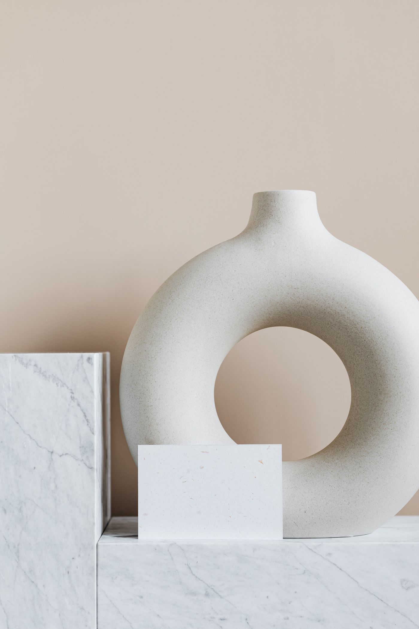A handmade white ceramic vase