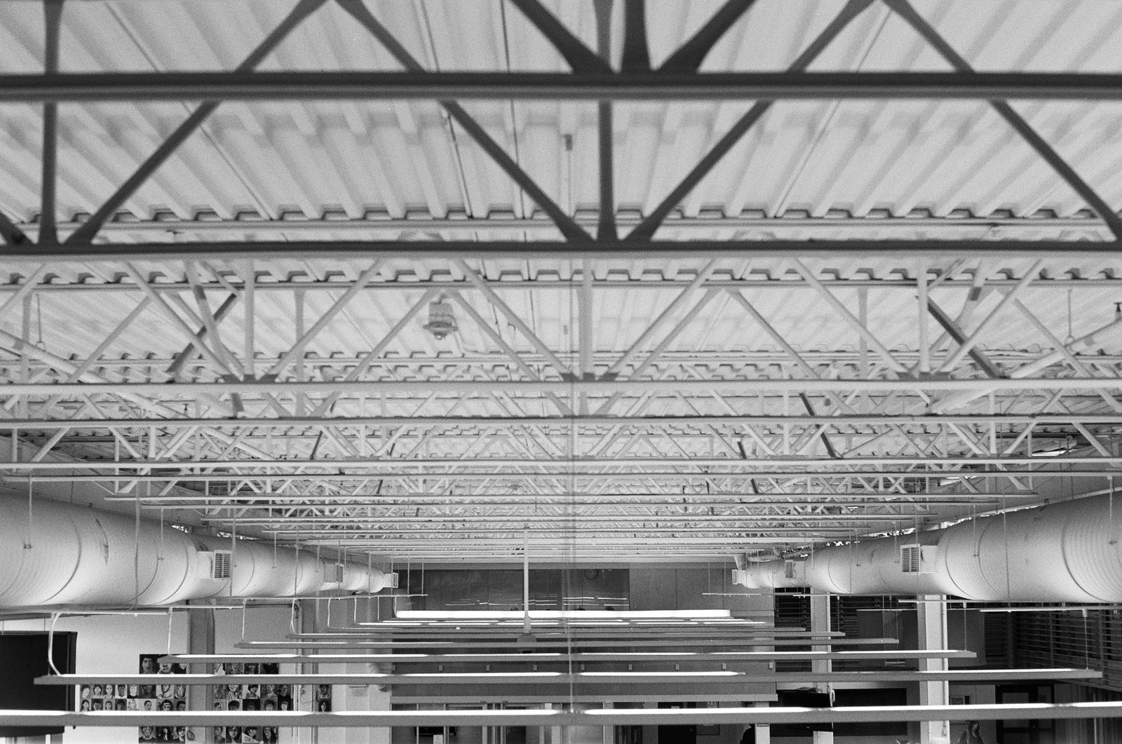 Exposed metal ductwork running across a mechanical ceiling