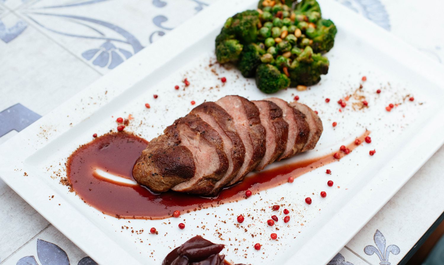 Sliced roast beef plated with garnish