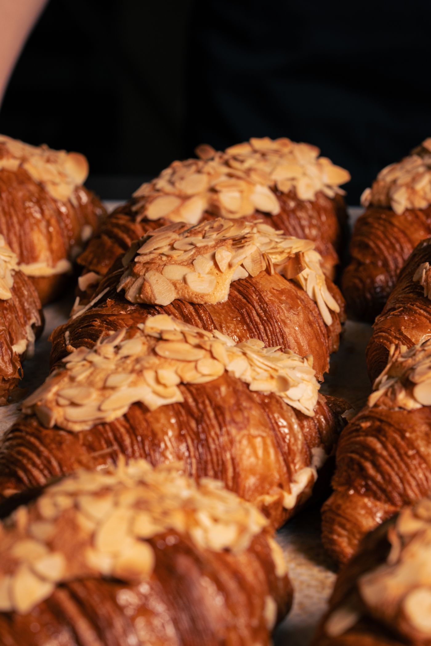 Almond croissants topped with slivered almonds