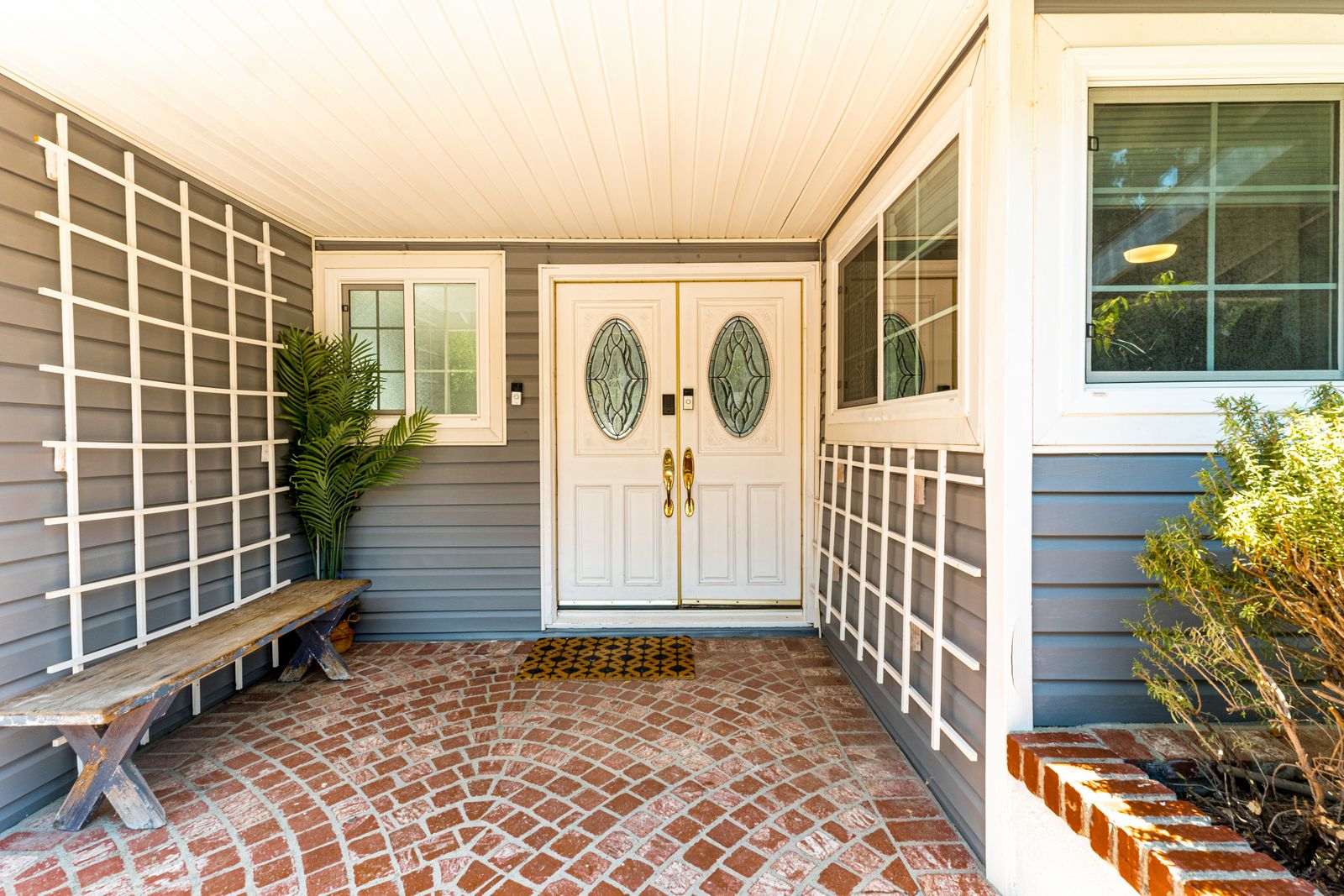 A double-door entry with sidelights