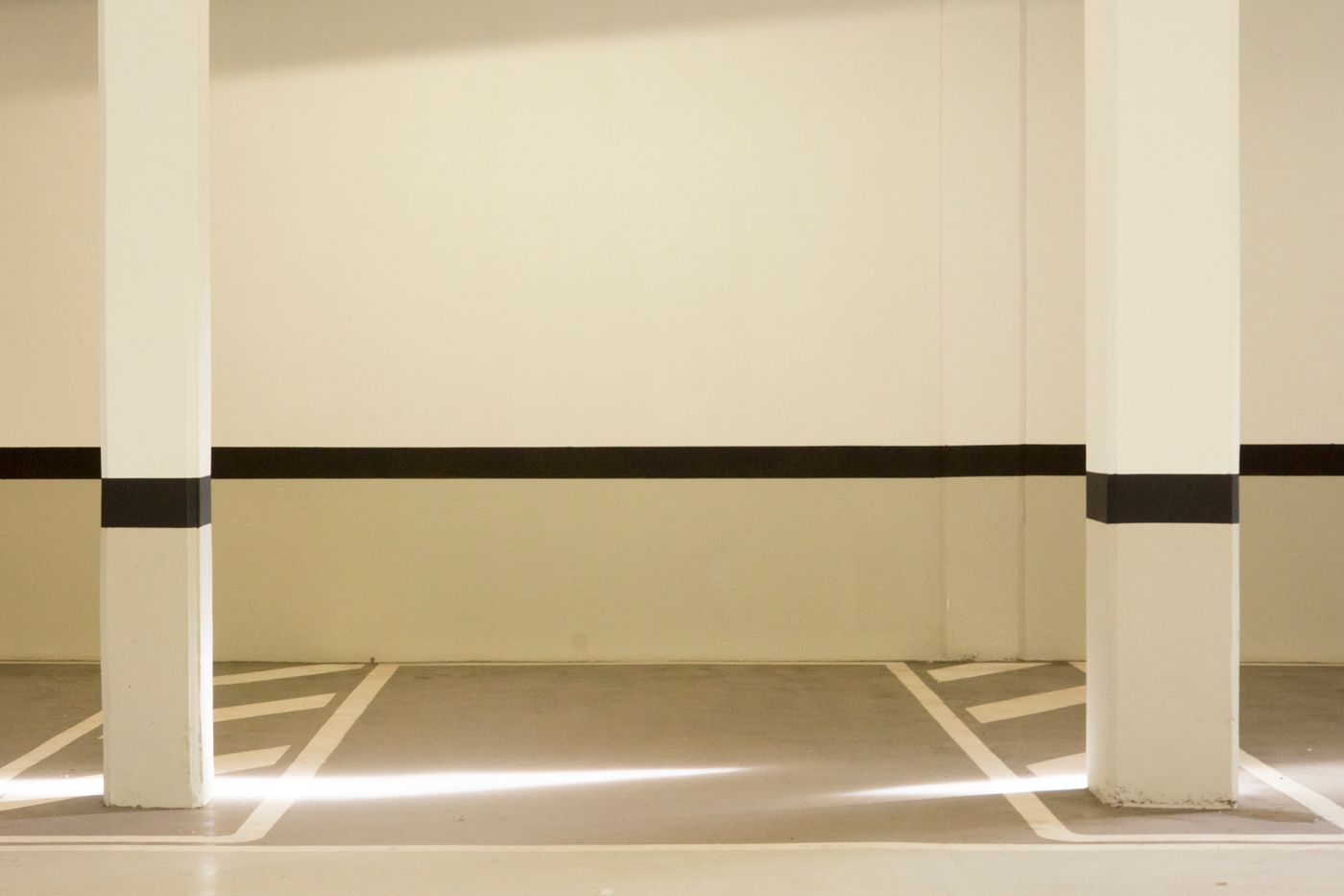 A garage floor freshly coated in seamless epoxy