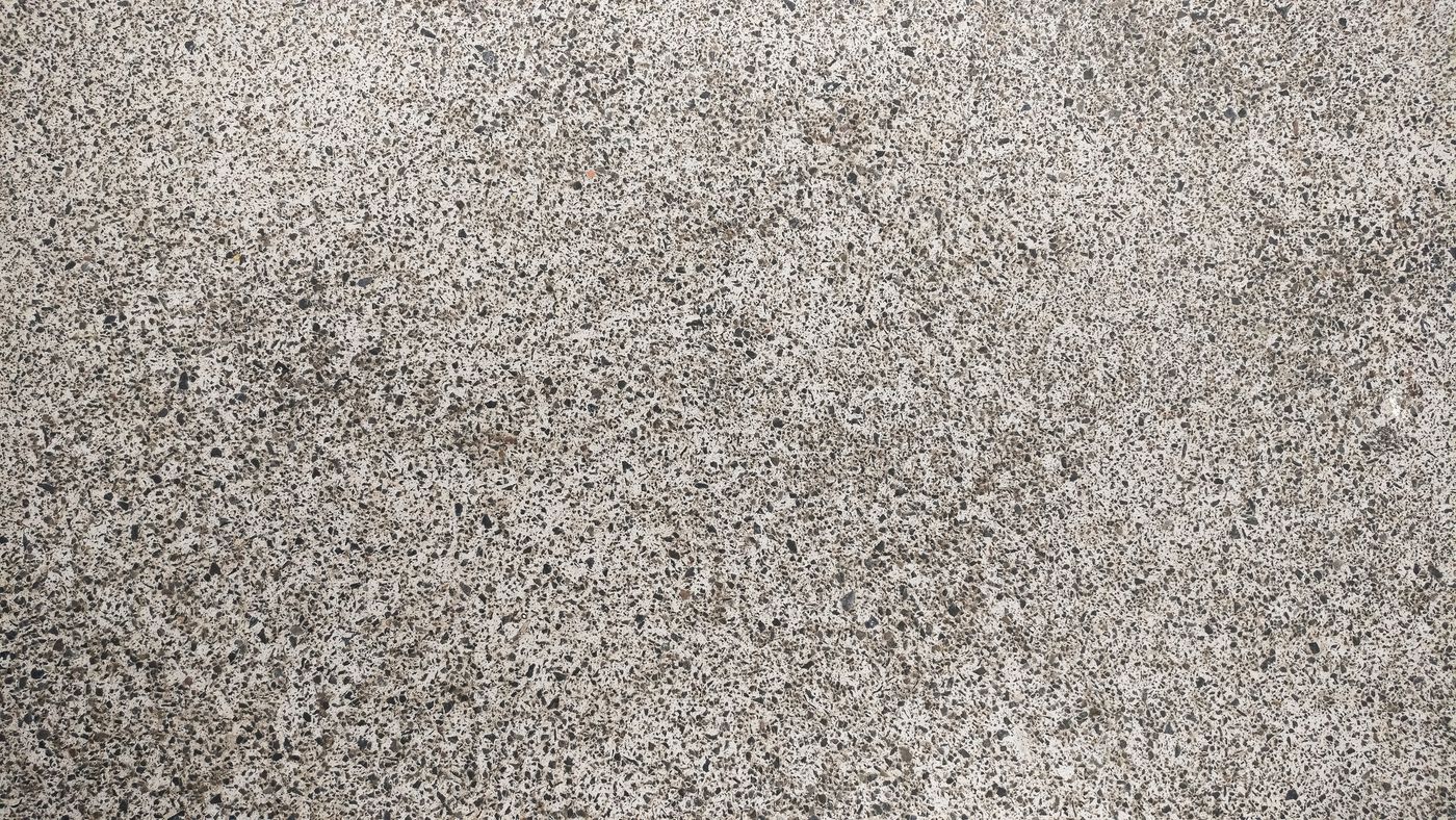Close detail of a speckled flake epoxy floor coating