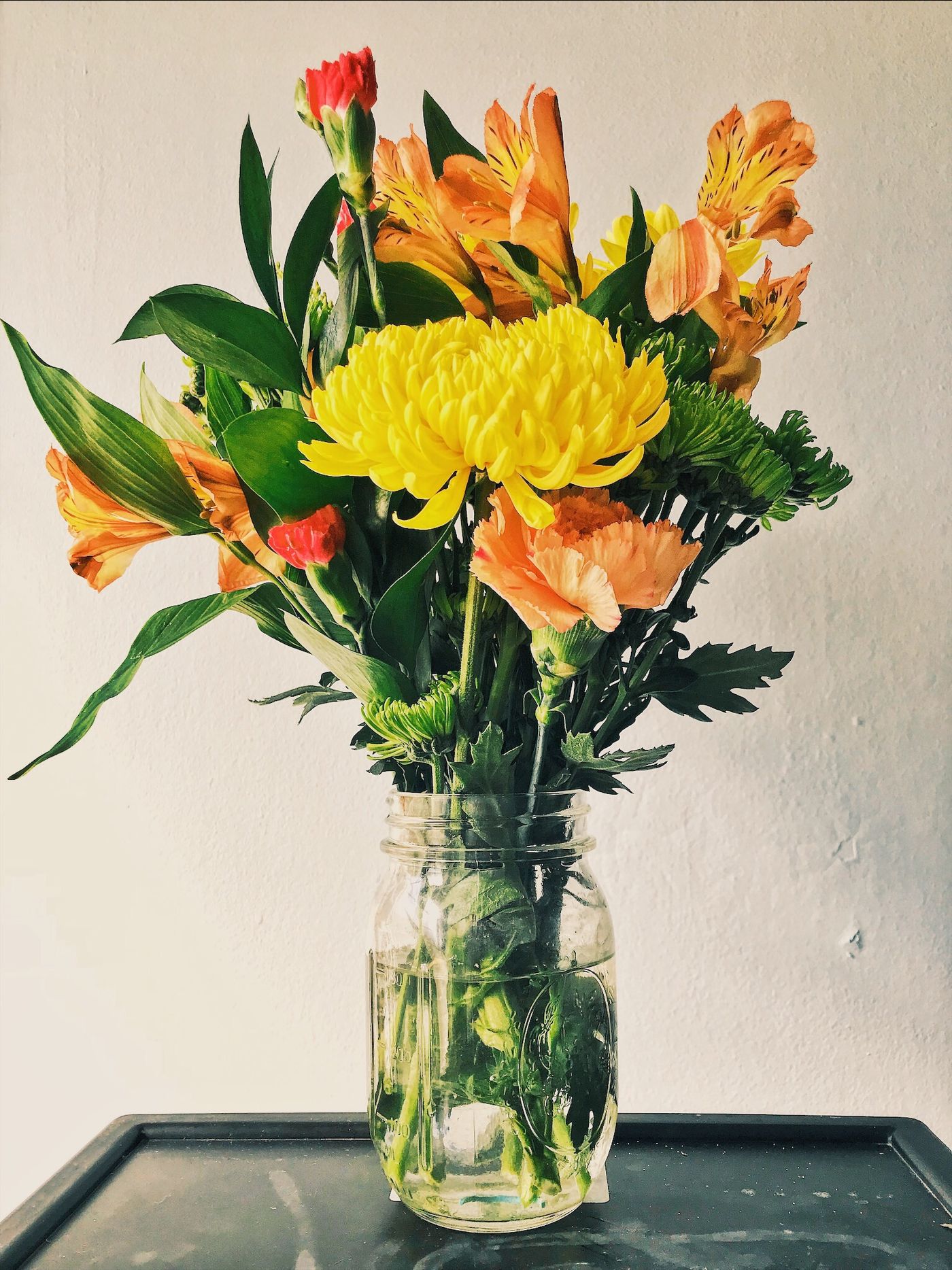 Mixed garden-style bouquet in a vase