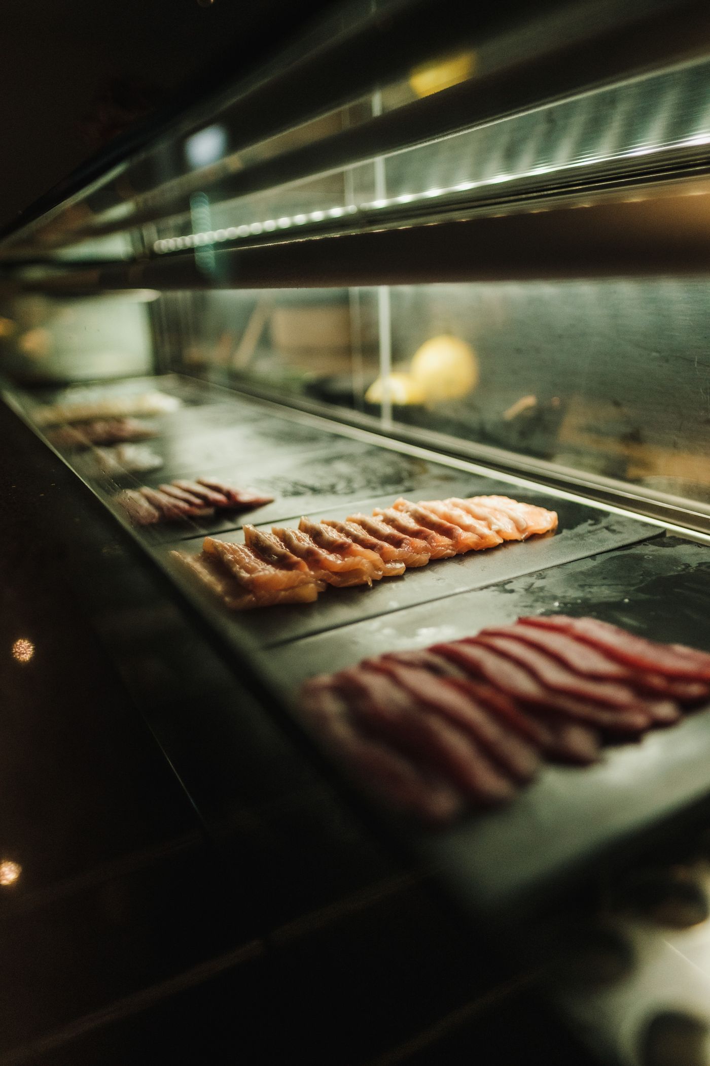 Smoked and cured meats in the case