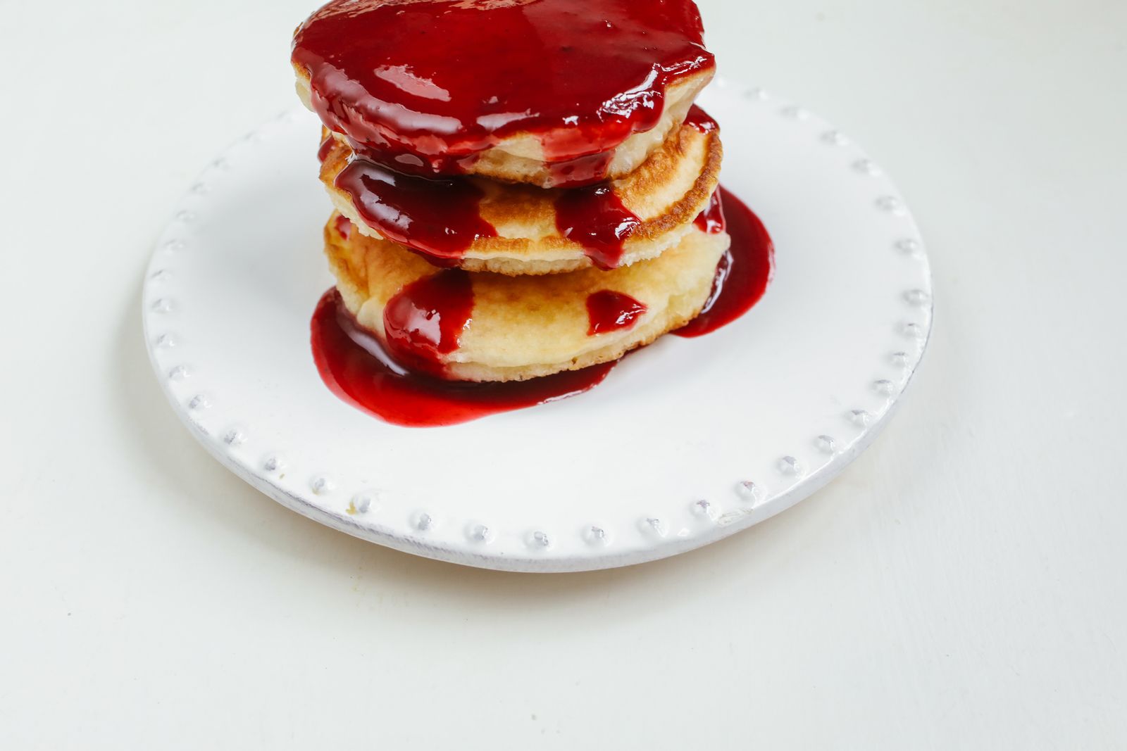 Danish pastries glazed with berry jam