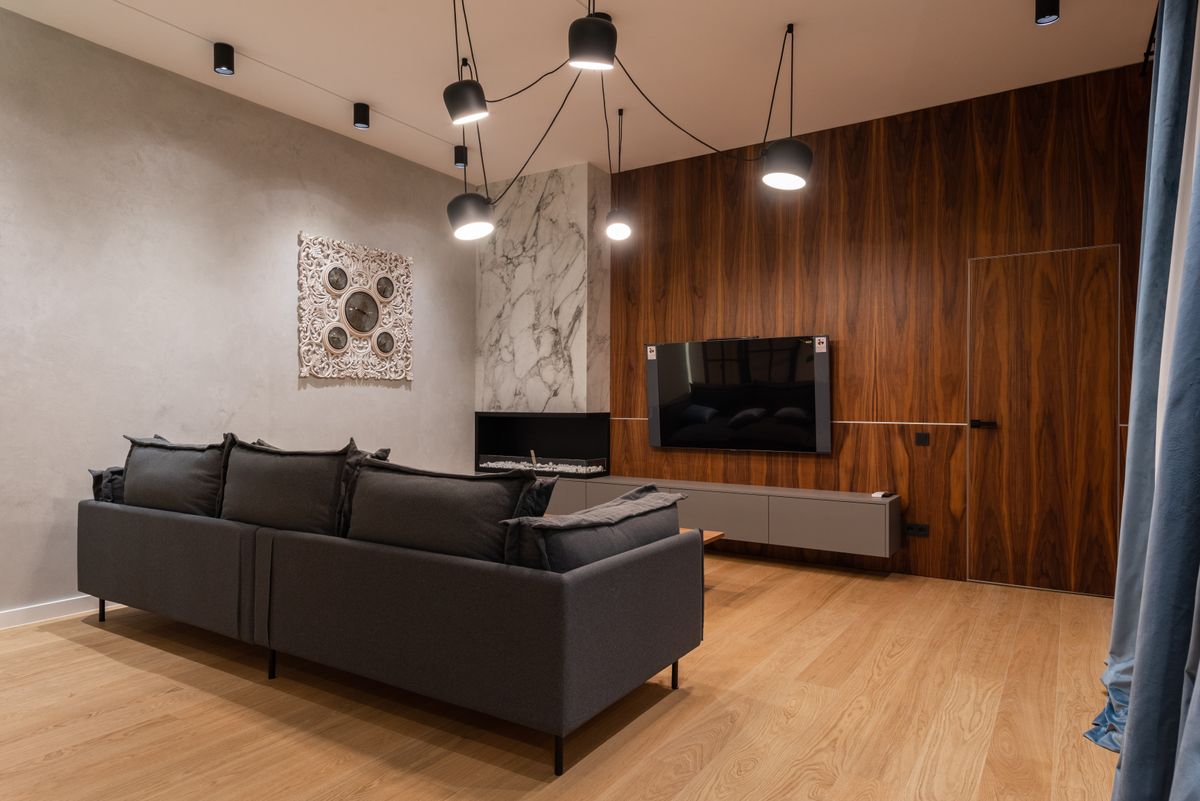 A bright, fully restored living room after damage repair