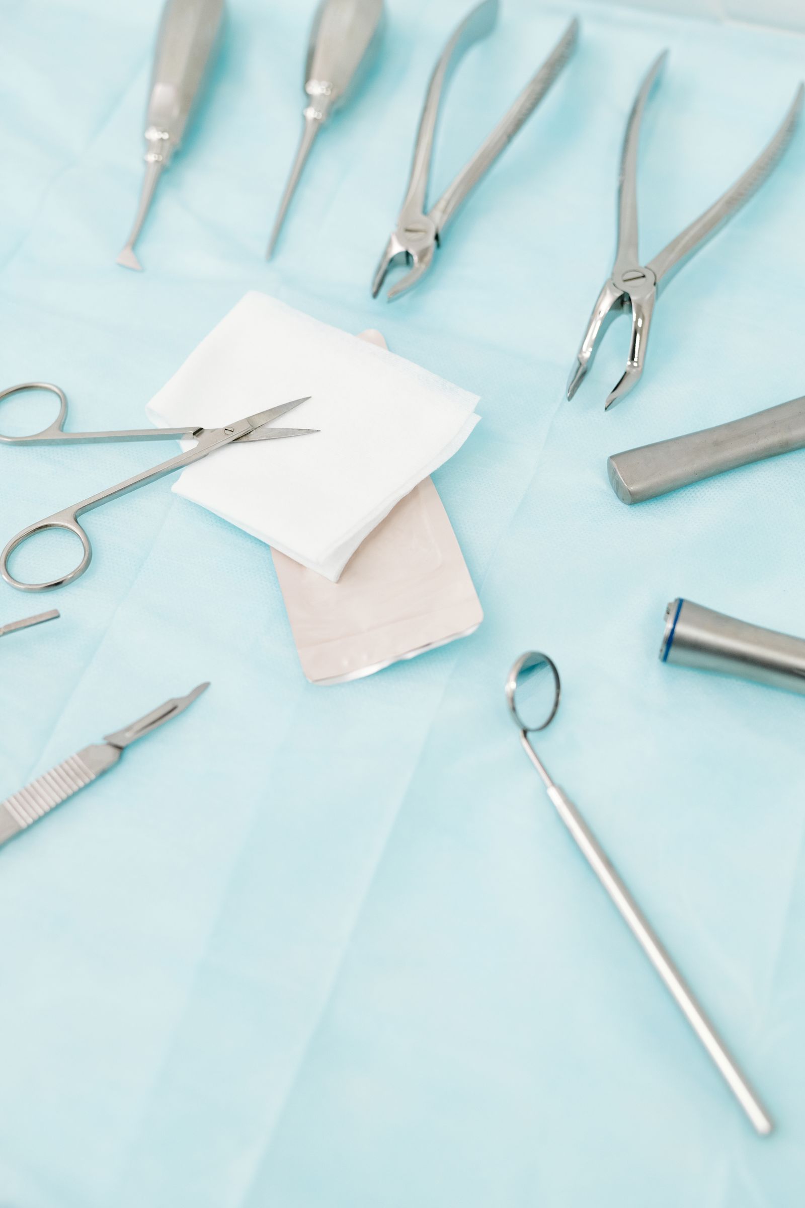 A clean tray of clinical instruments