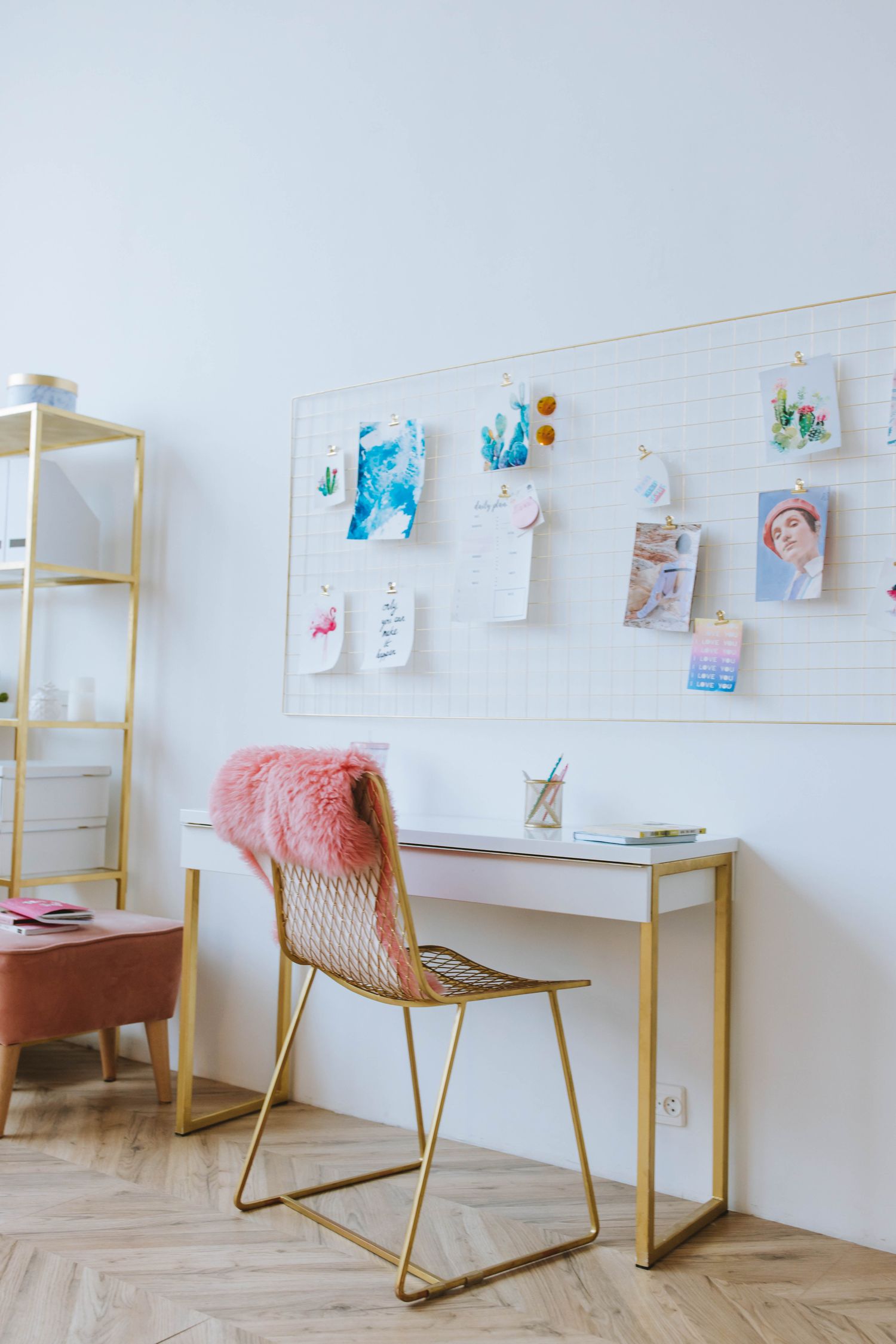 A styled wall with a shelf and memo board