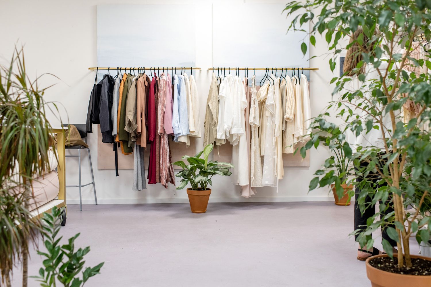 Clothing racks in a bright boutique