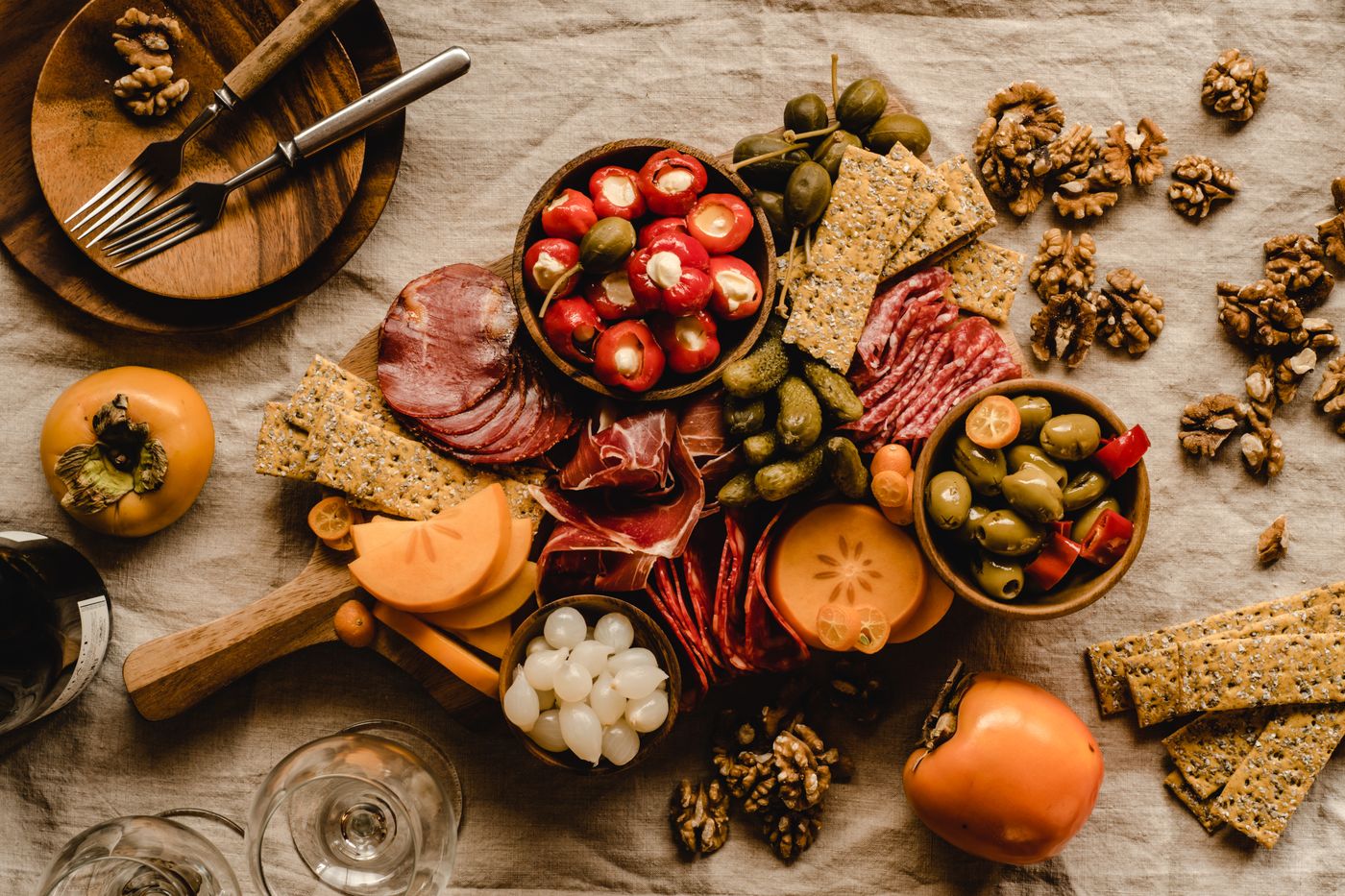 Mediterranean charcuterie board with cured meats and olives
