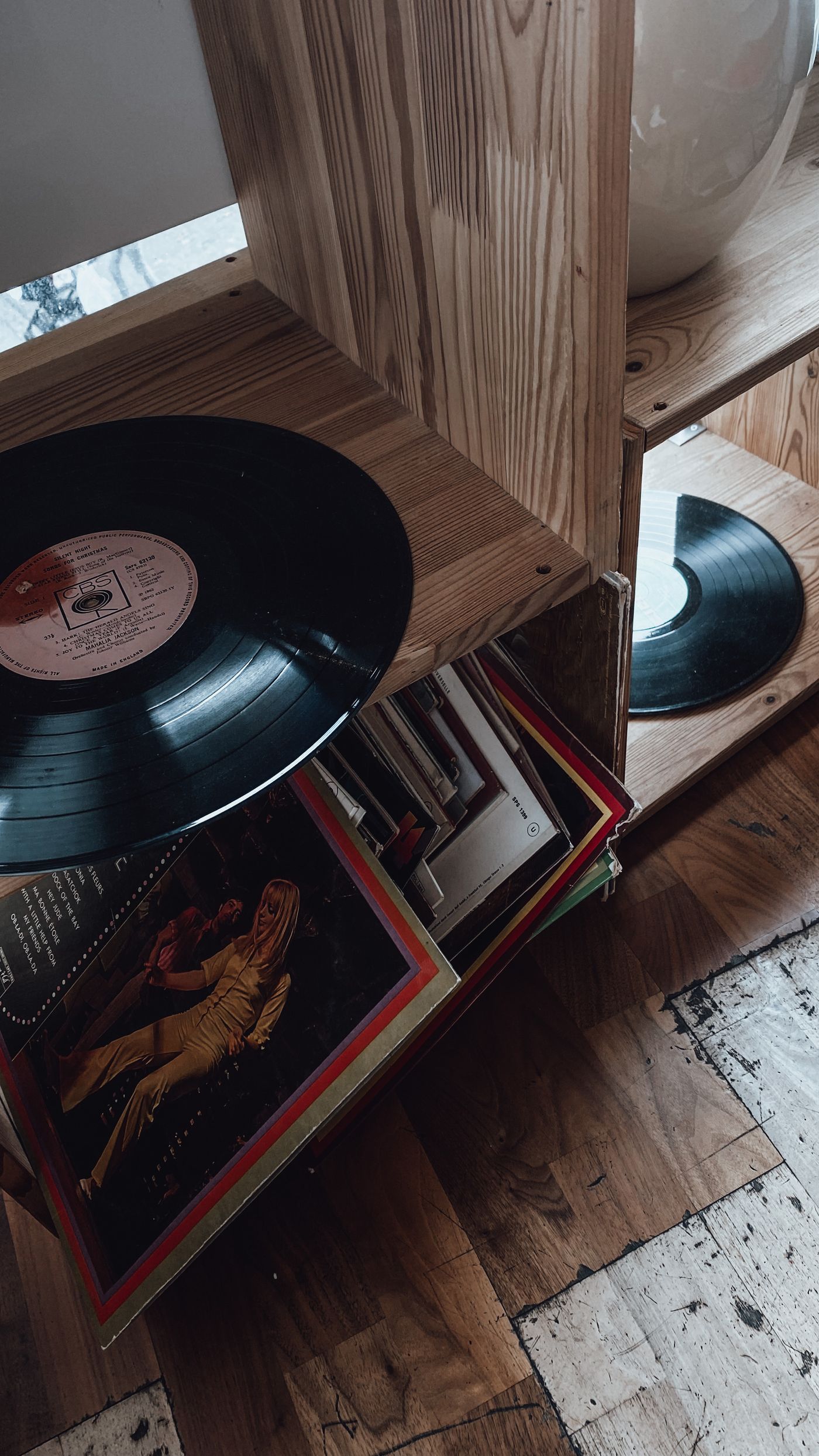 Two LPs out of their sleeves
