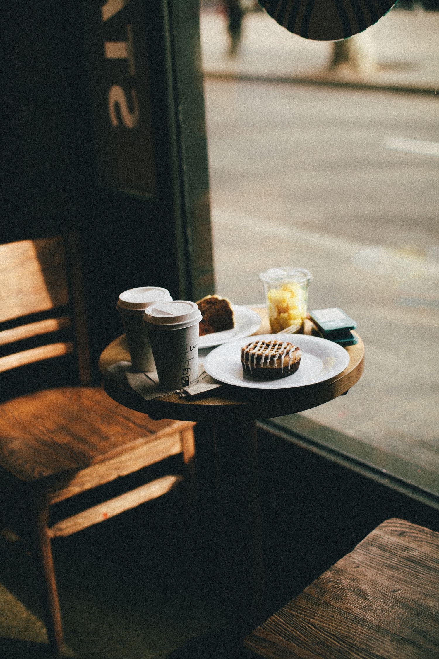 Coffee and pastries on a cafe table