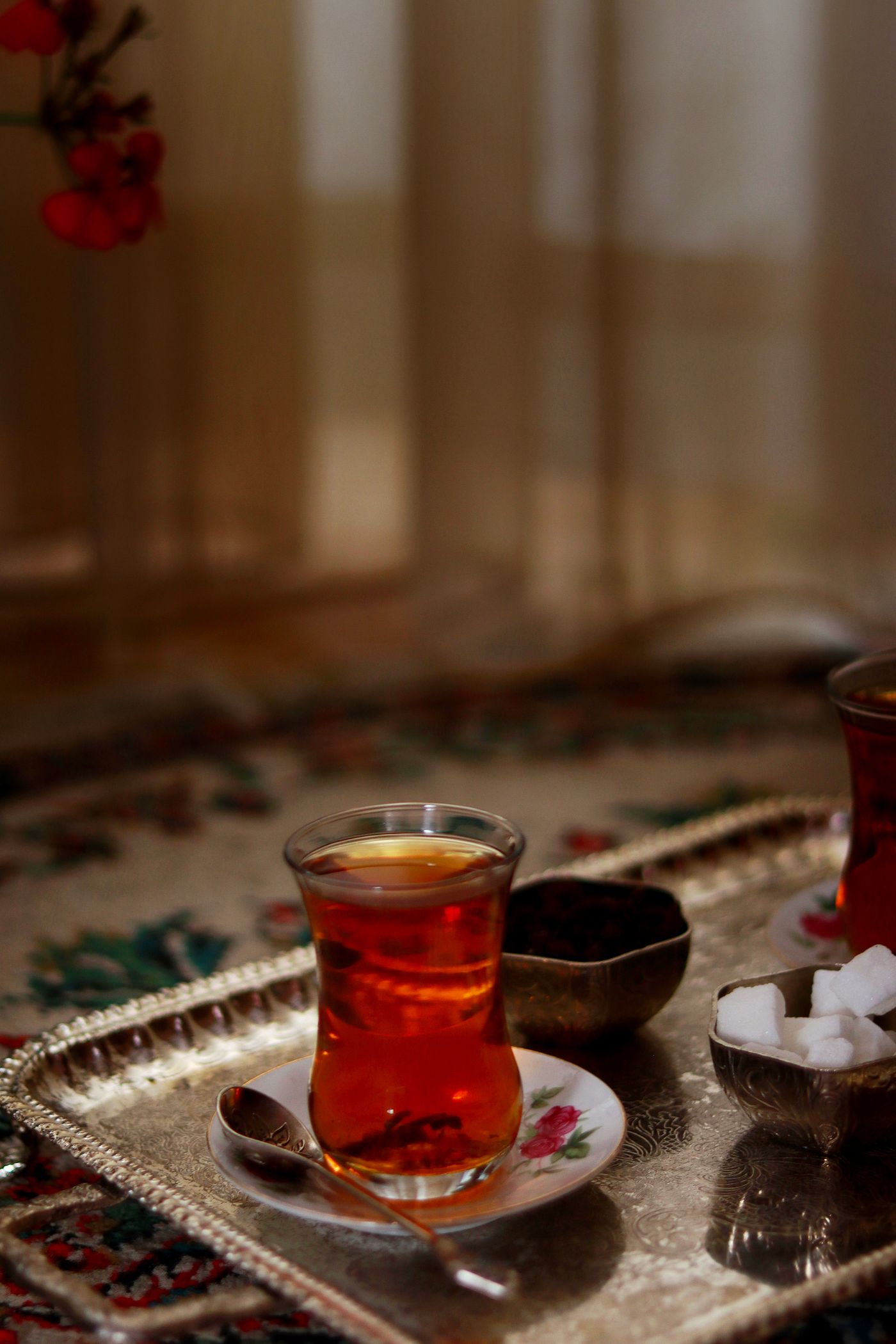 Persian tea served in a glass on a tray