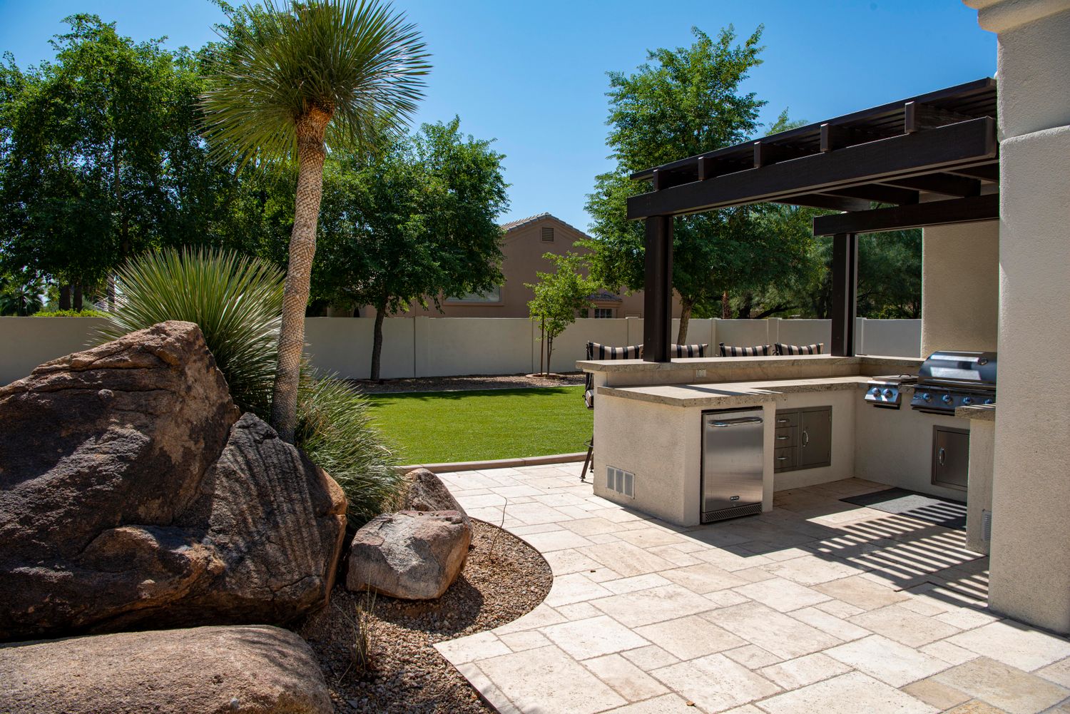 Finished paver patio with landscaping