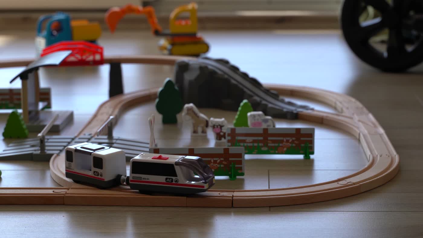 A wooden toy train on a track