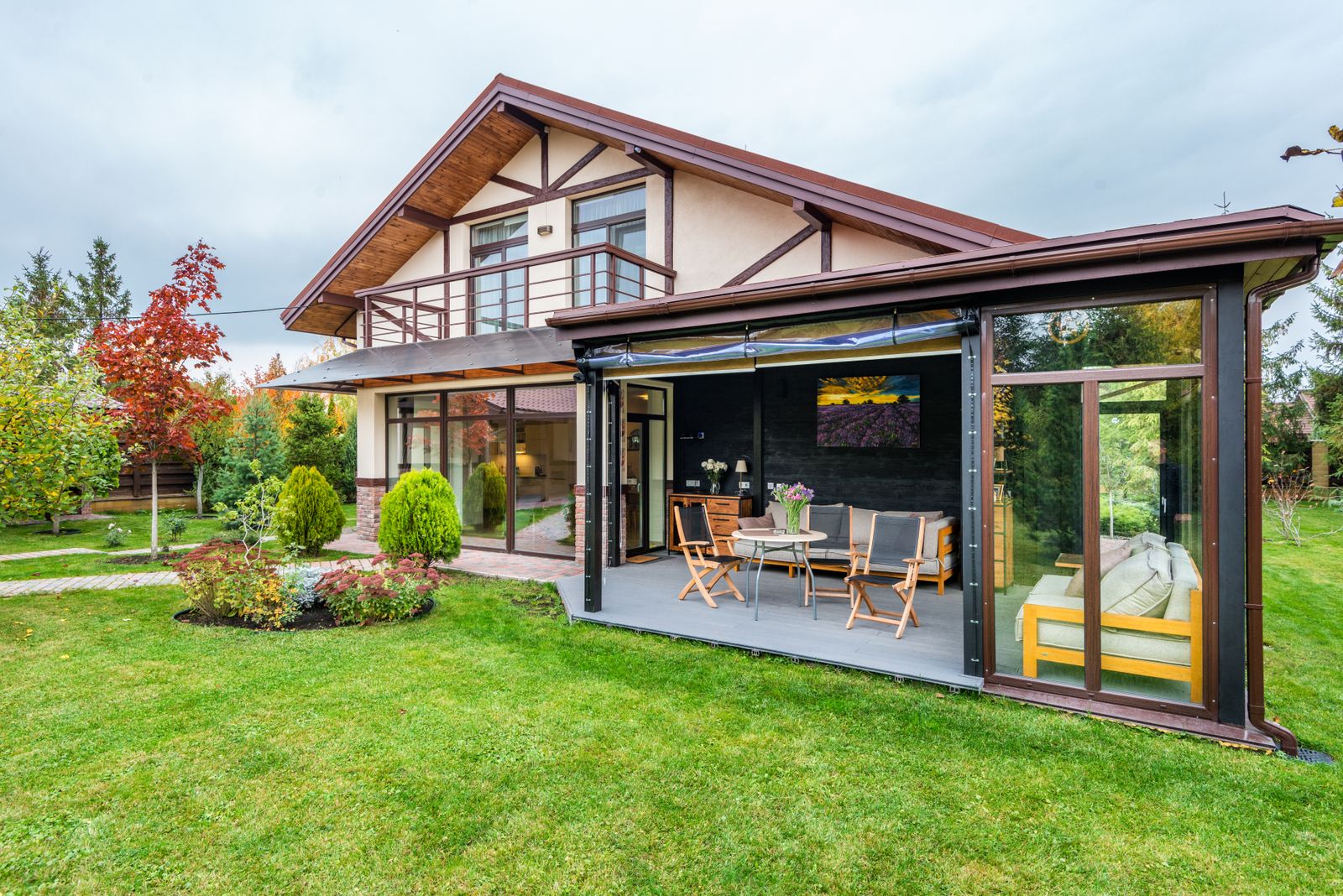 Renovated home exterior with patio