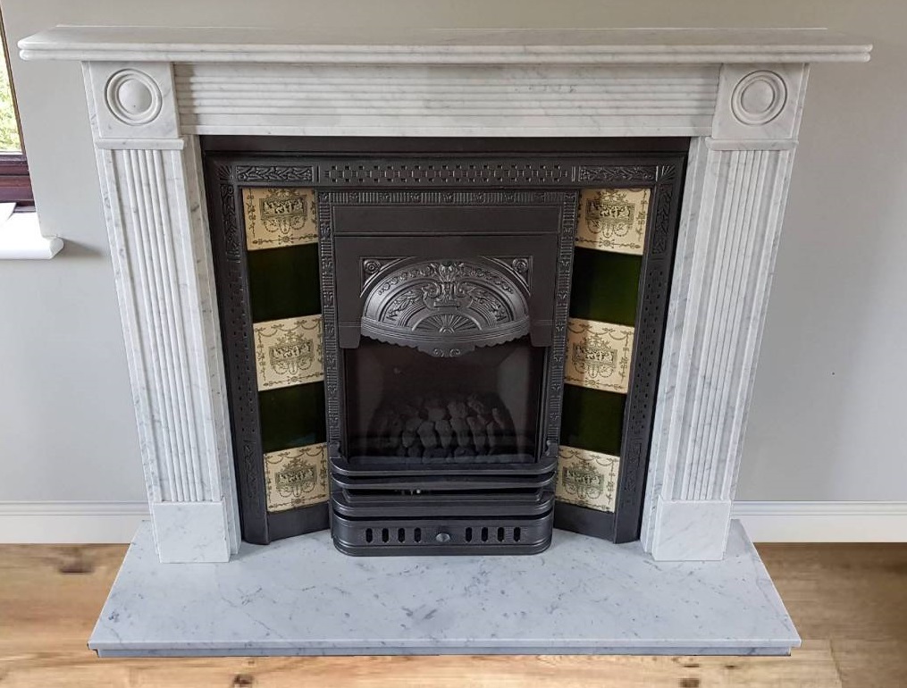 A gas insert set into a marble surround