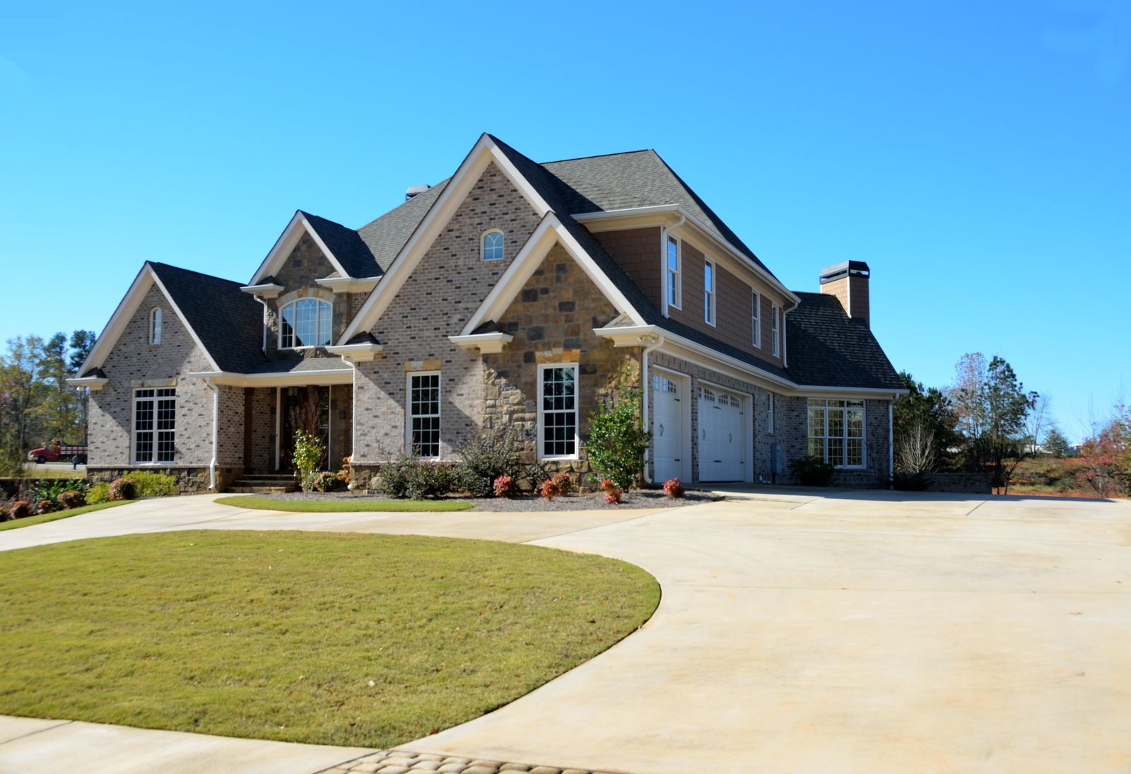 Large home with roofline, eaves and gutters