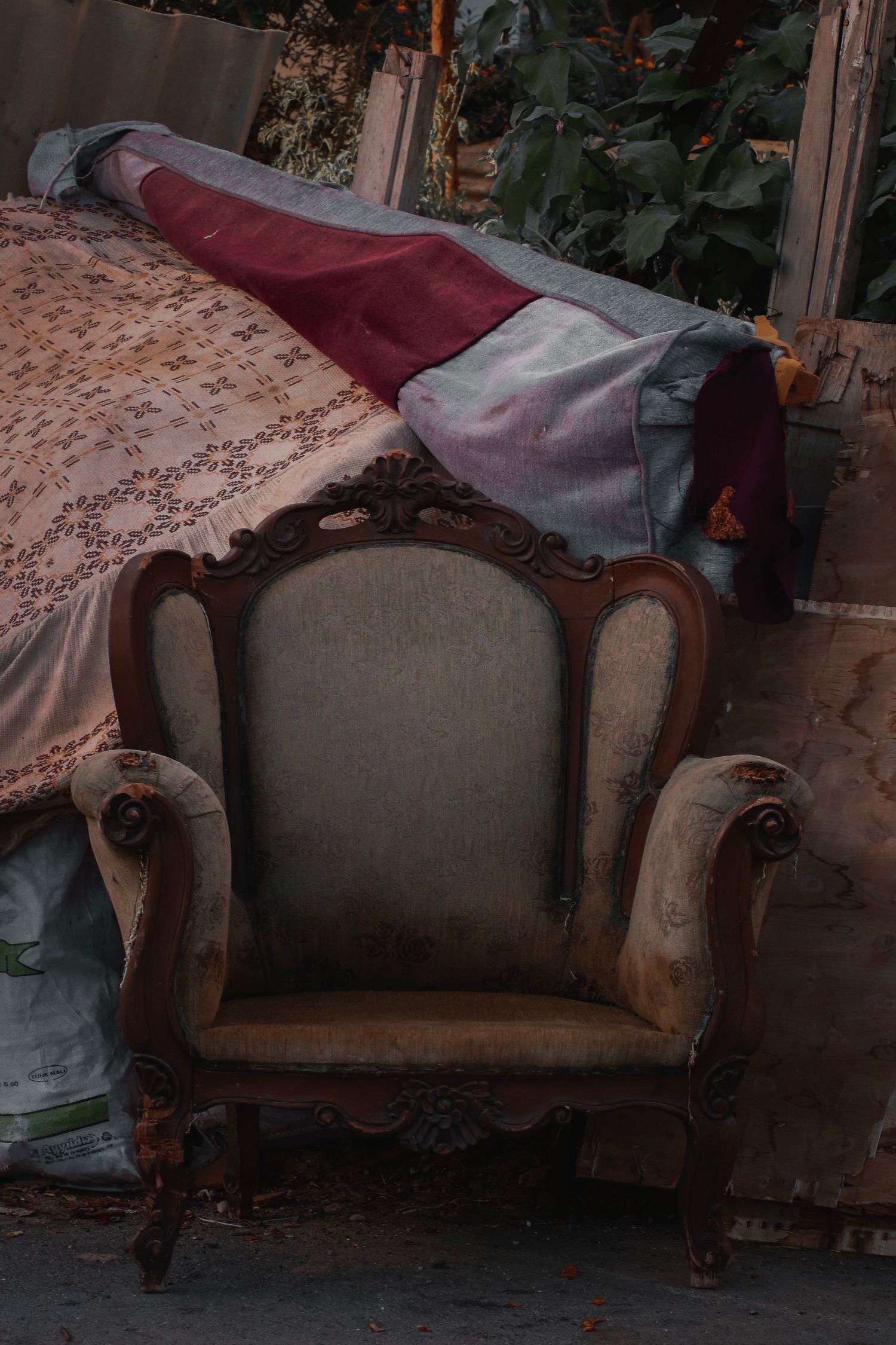 Discarded armchair for removal