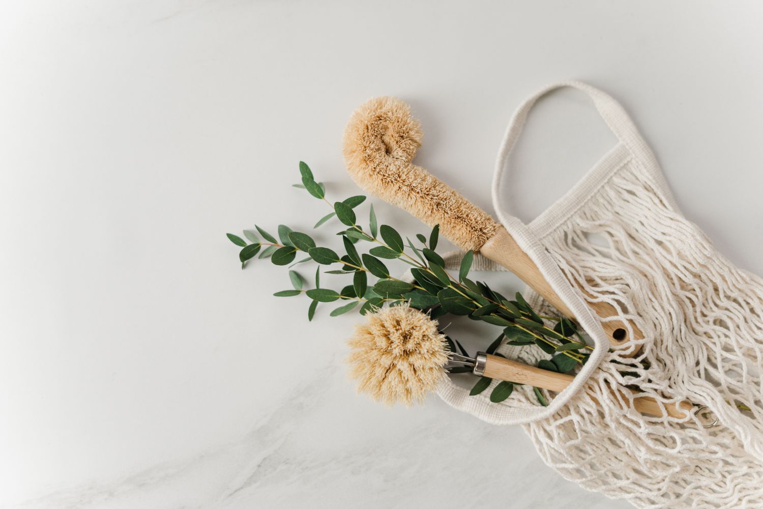 Dried botanicals with a mesh bag and scoop