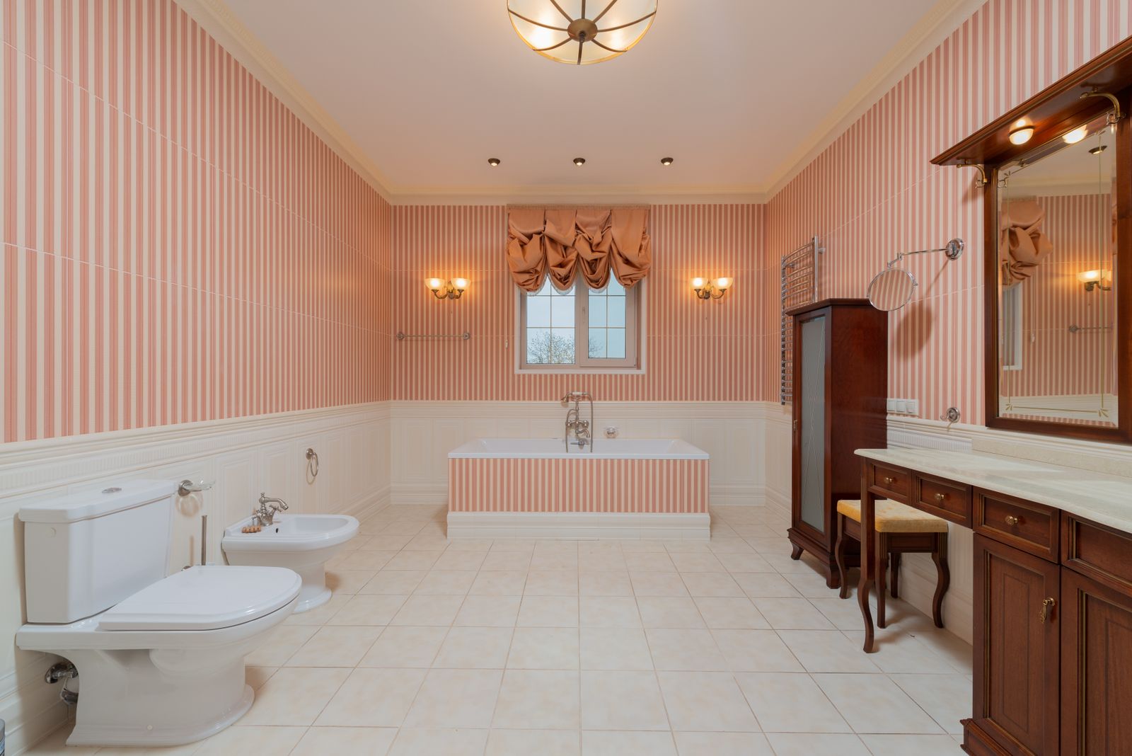 A freshly painted bathroom in soft tones