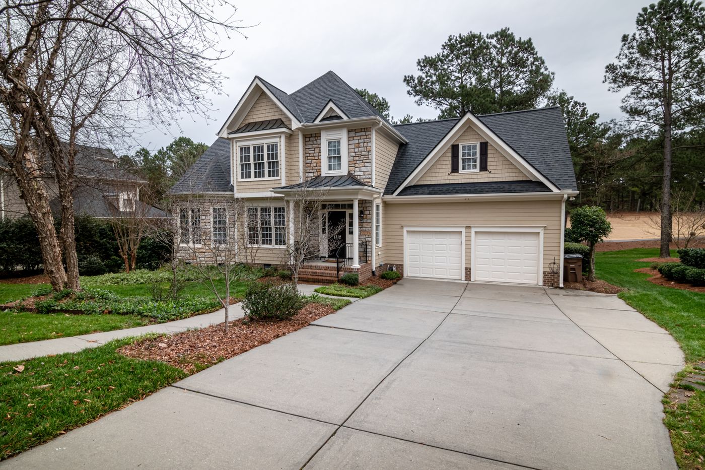 Suburban home with clean driveway