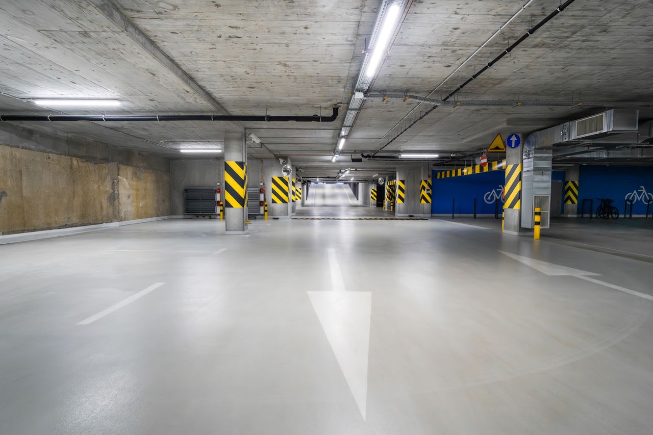 Coated commercial floor with markings