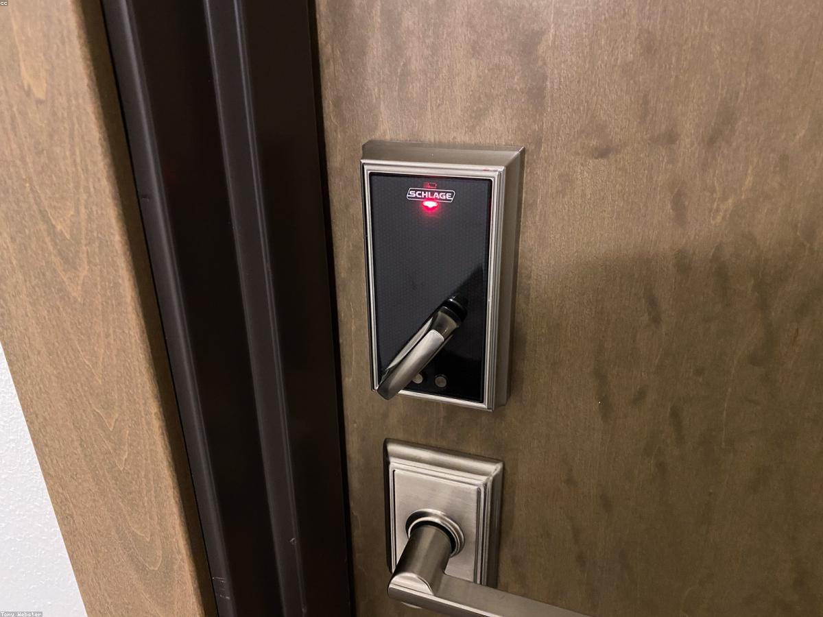A smart deadbolt and keyed lever freshly fitted to a door