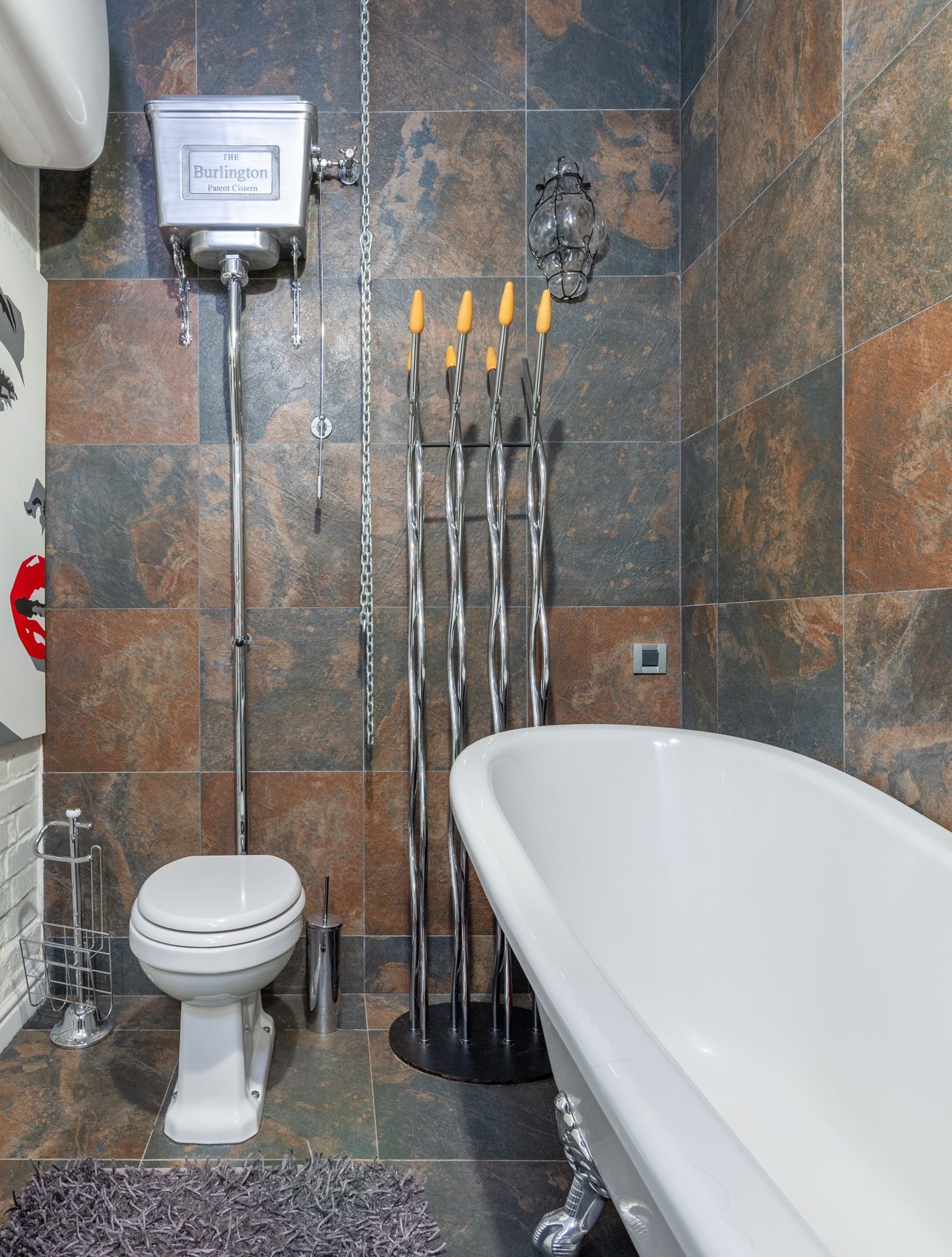 Clean white bathtub in finished bathroom